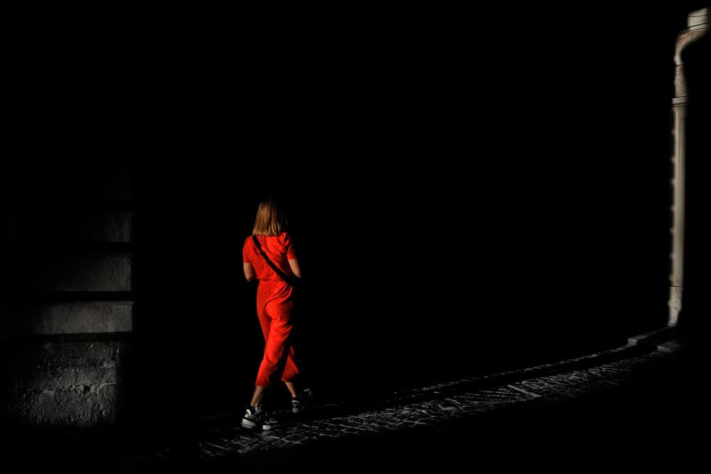 Red Figure in Shadow by Antonio Grambone — canvas wall art