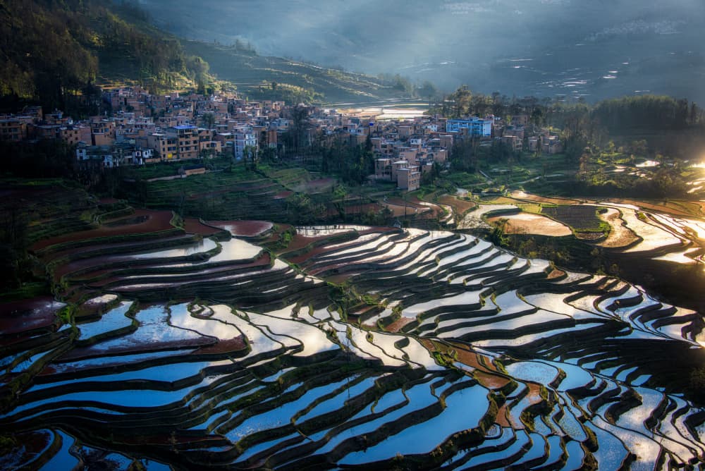 Village Over Rice Terraces by Johnny Zhang — canvas wall art