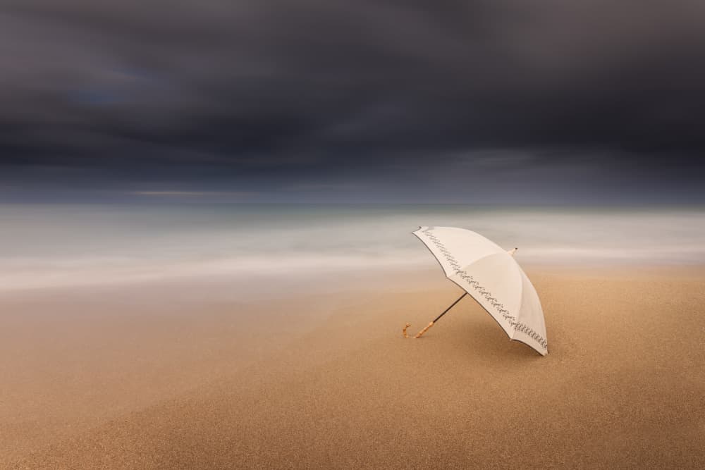 Lonely Beach Umbrella by Rico Cavallo — canvas wall art