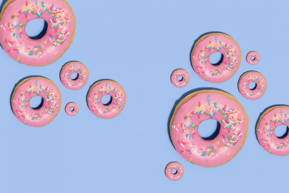 Pink Sprinkled Donuts by Julia Ramiro — canvas wall art