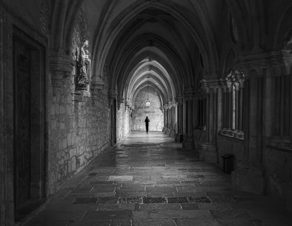 Lone Figure Cloister by Andy Dauer — canvas wall art