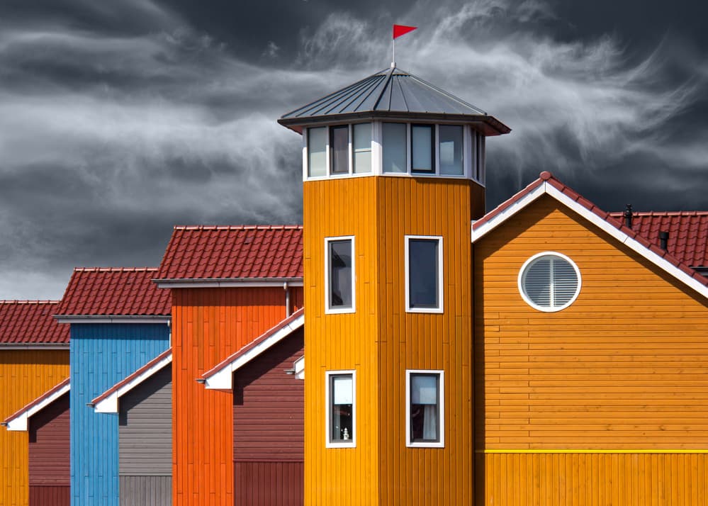 Vibrant Buildings Stormy Sky by Theo Luycx — canvas wall art