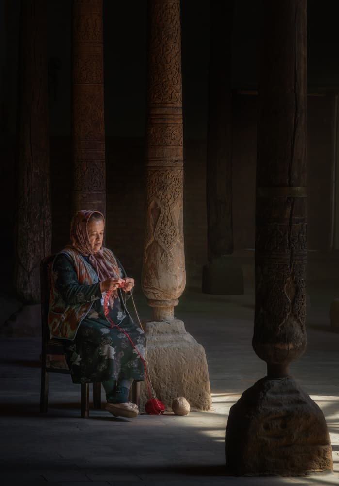 Woman Knitting Warm Light by Antoni Figueras — canvas wall art