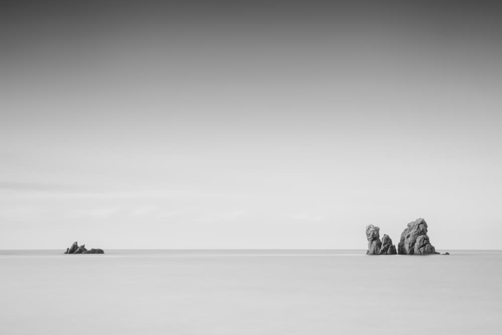 Minimalist Ocean Rocks by Catalin Baican — canvas wall art