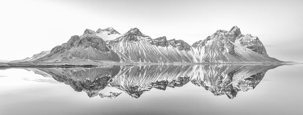 Dramatic Mountain Reflections by April Xie — canvas wall art