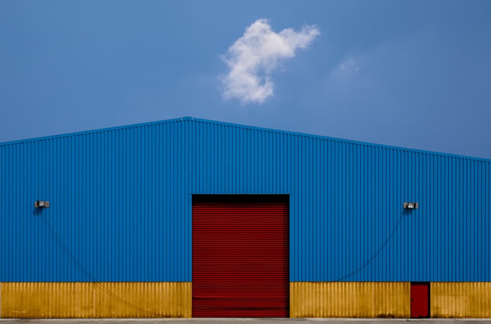Vibrant Warehouse Facade by Harry Verschelden — canvas wall art