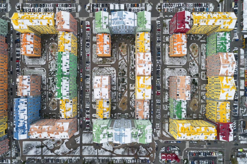 Vibrant Winter Cityscape by Łukasz Małkiewicz — canvas wall art