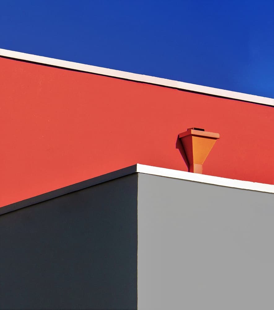 Red Wall Blue Sky by Arnon Orbach — canvas wall art