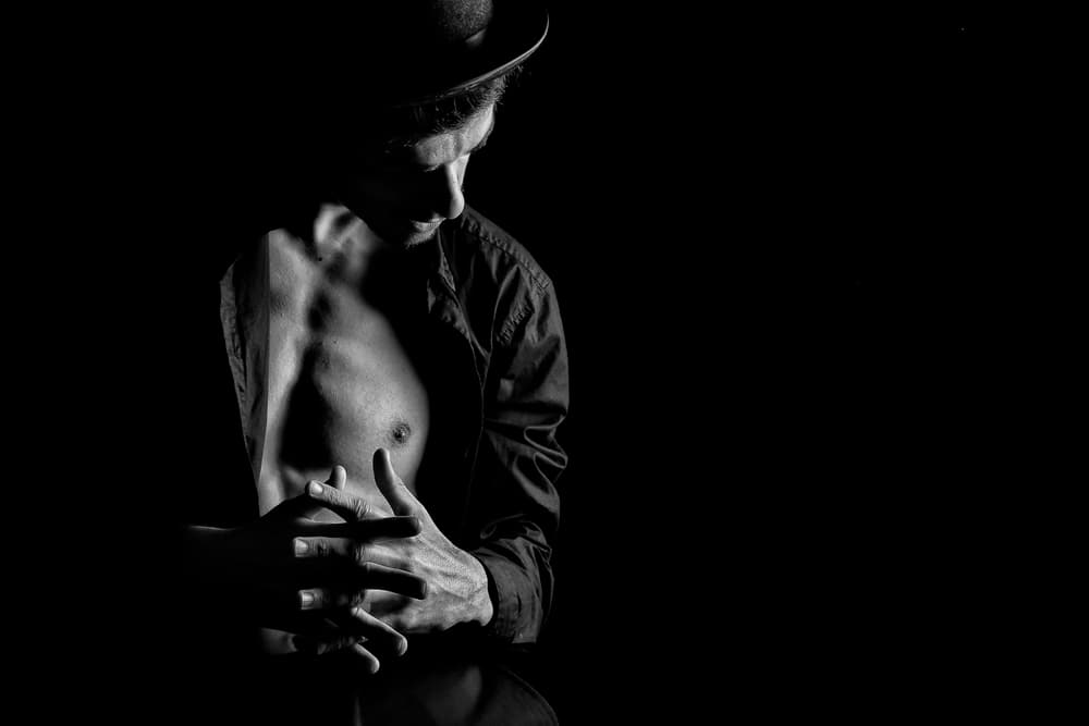 Pensive Man in Hat by Paulo Medeiros — canvas wall art