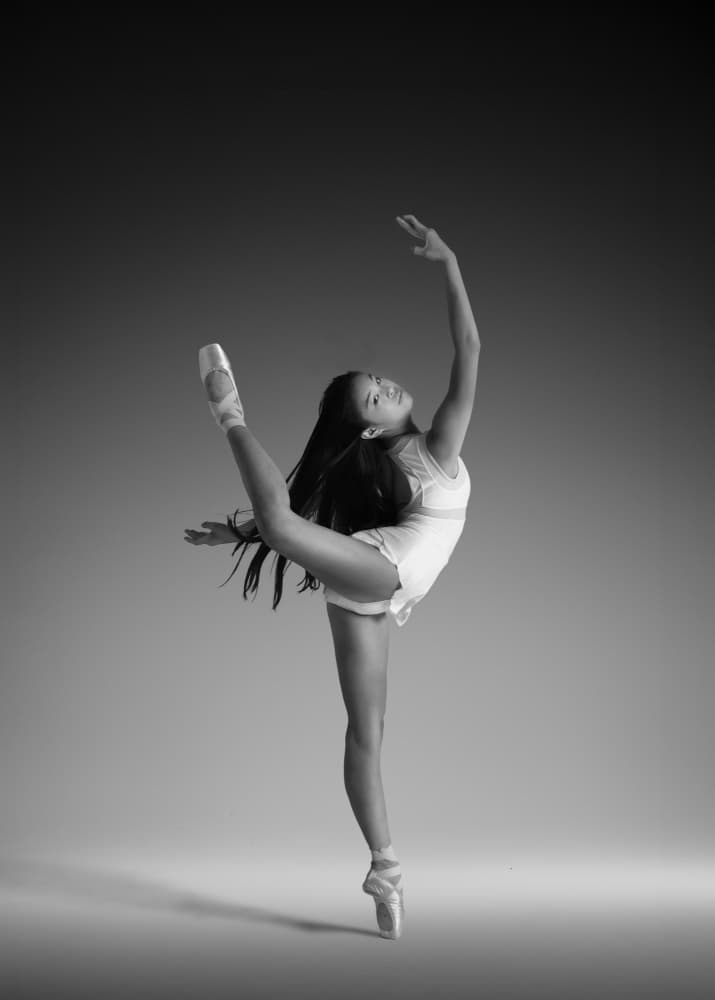 Graceful Ballerina Pose by Rob Li — canvas wall art