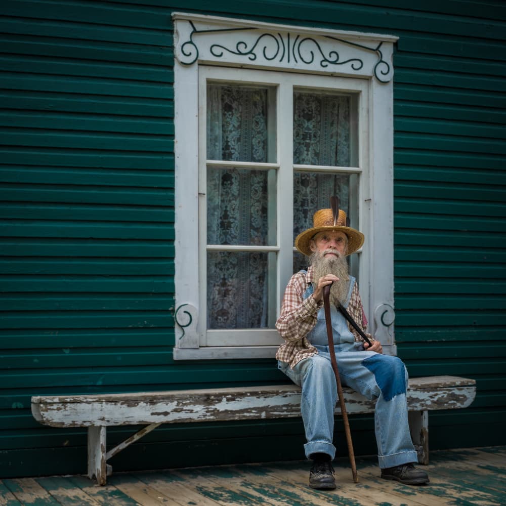 Rustic Man on Bench by Miroslaw Prybinski — canvas wall art