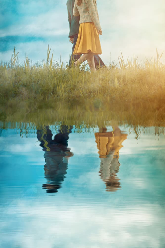 Couple's Lakeside Reflection by Ildiko Neer — canvas wall art