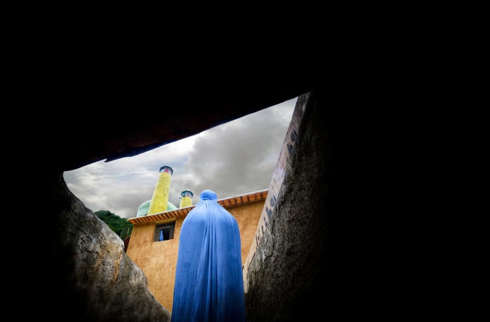 Blue Burqa City Scene by Marjan Taghipour — canvas wall art