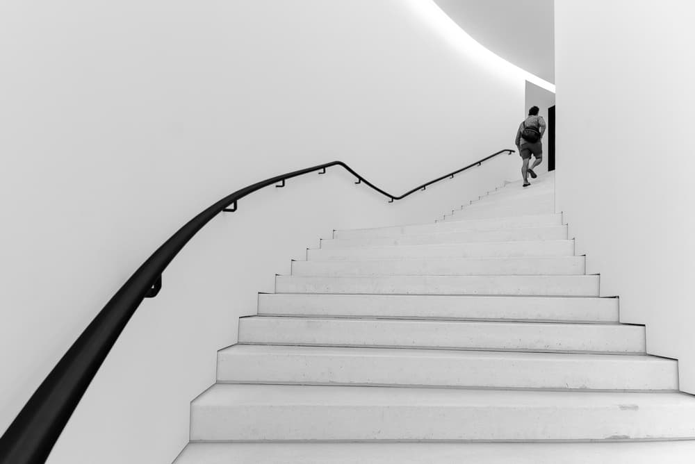 Man Ascending Modern Stairs by João Castro — canvas wall art