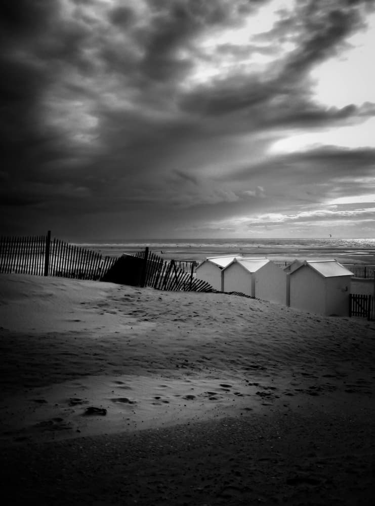 Moody Beach Huts by Stephanie Kleimann — canvas wall art