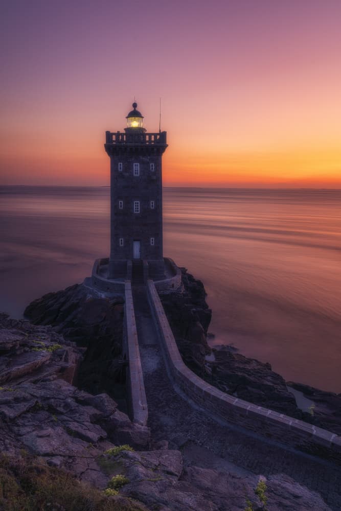 Serene Lighthouse Sunset by Oskar Baglietto — canvas wall art