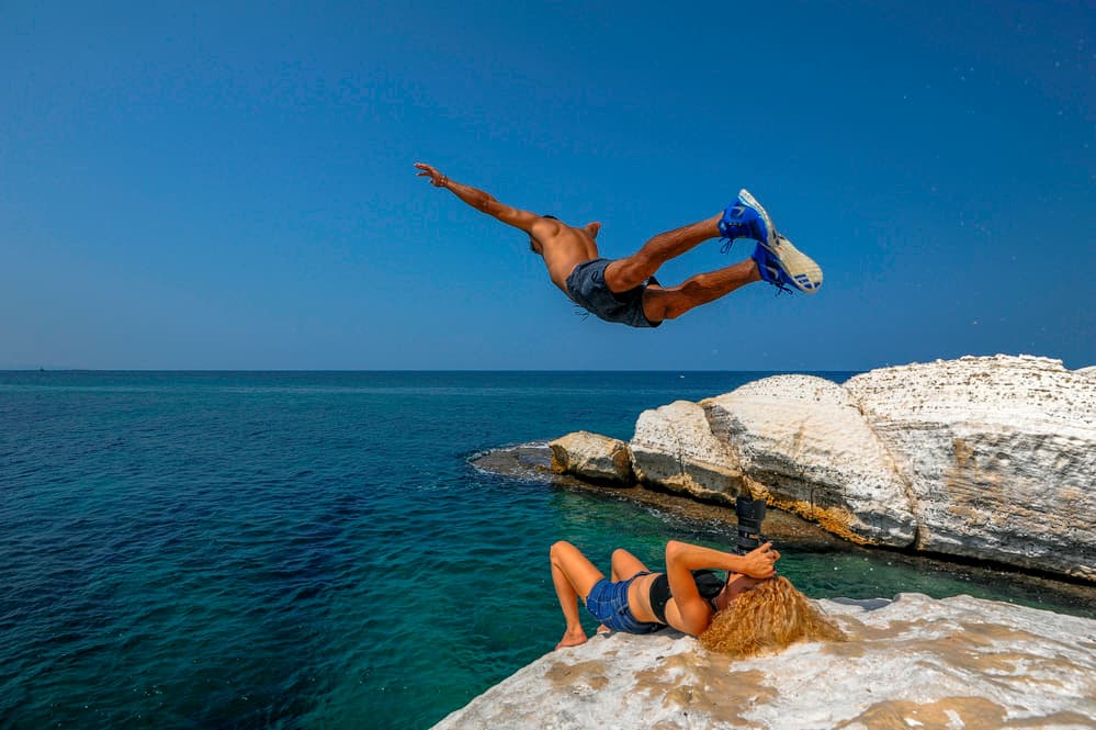 Summer Cliff Jump by RABIA BASHA ARTIST — canvas wall art