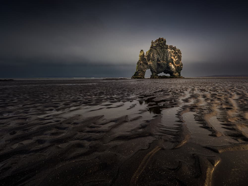 Moody Coastal Rock Arch by Radek Pohnan — canvas wall art