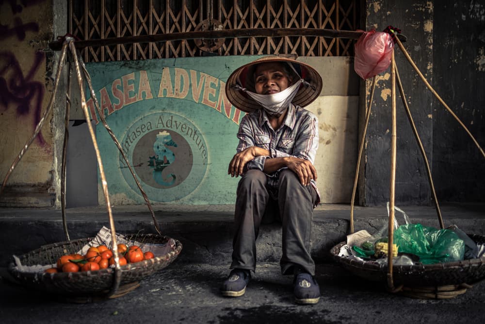 Quiet Market Vendor by Marco Tagliarino — canvas wall art