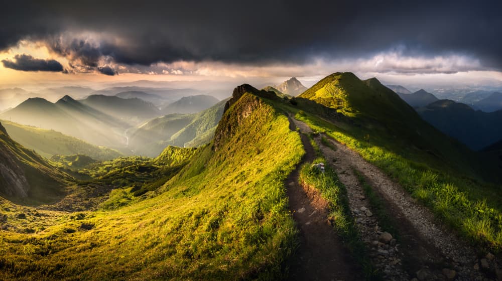 Sunlit Mountain Ridge Trail by Karol Nienartowicz — canvas wall art