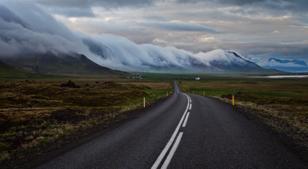 Winding Road Through Mountains by Wim Denijs — canvas wall art
