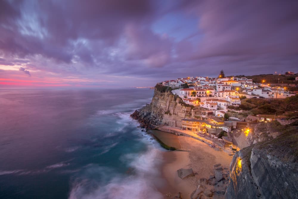 Twilight Cliffside Village by Fernando Piçarra — canvas wall art