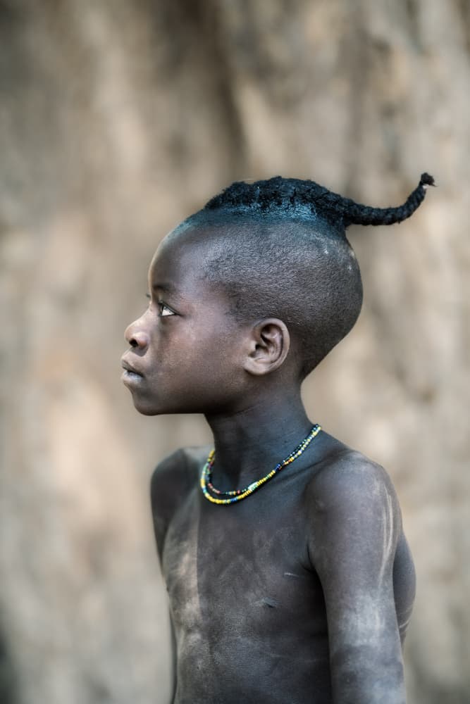 Young Boy's Tribal Profile by Trevor Cole — canvas wall art