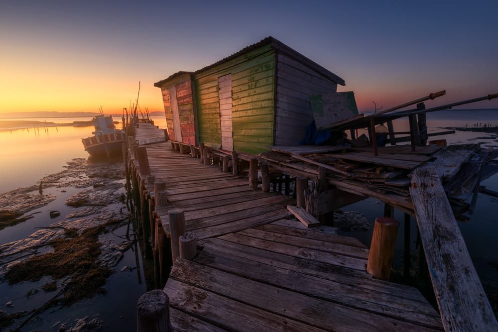 Rustic Sunset Pier by Iván Ferrero — canvas wall art