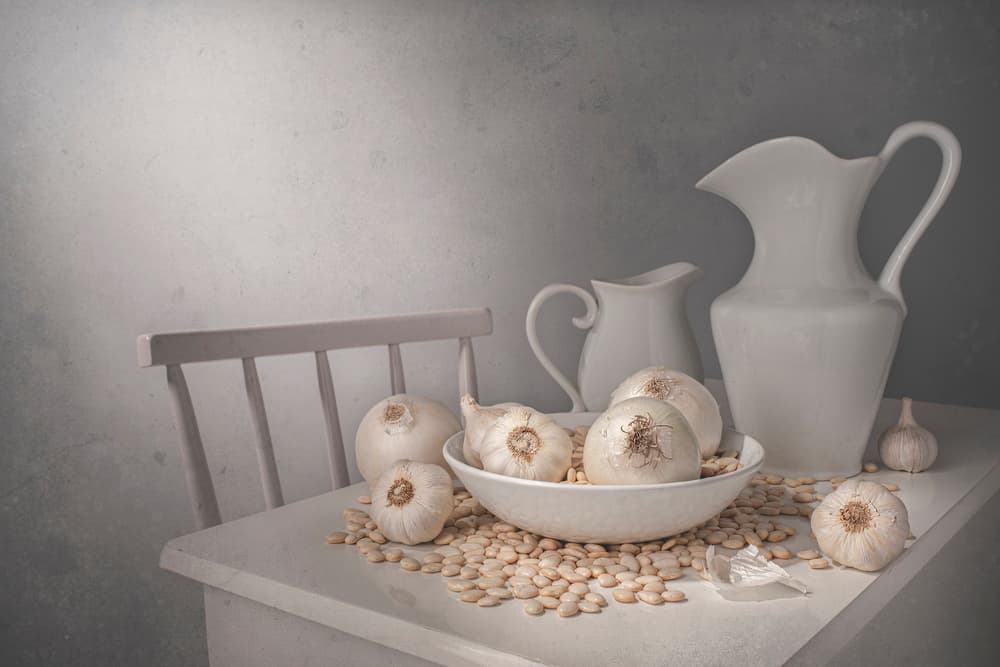 Garlic and White Pitchers by Margareth Perfoncio — canvas wall art
