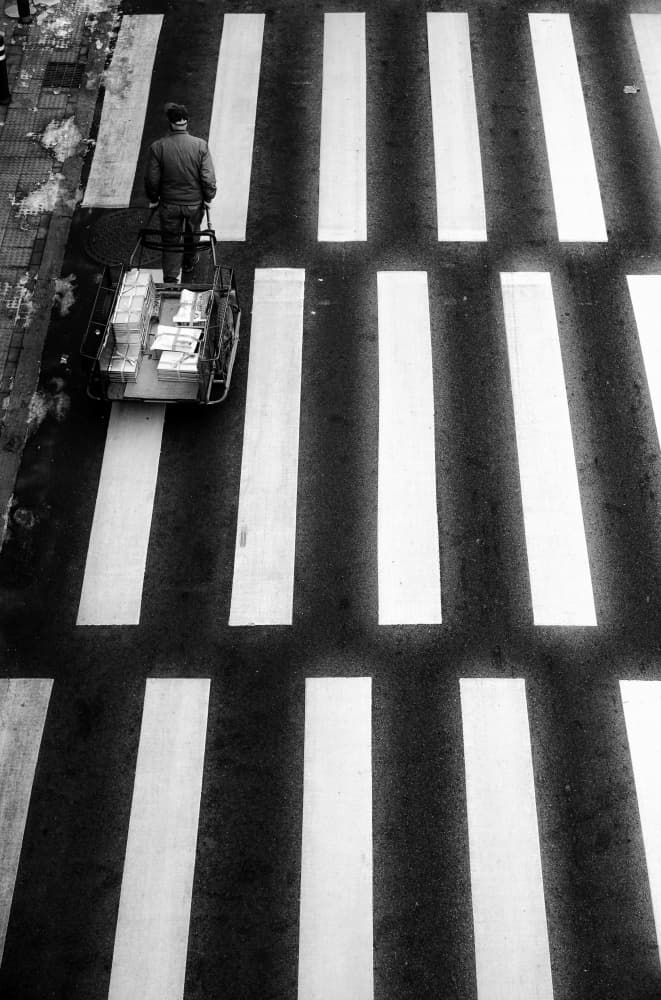 Urban Delivery Crossing by Bong Goo Kang — canvas wall art