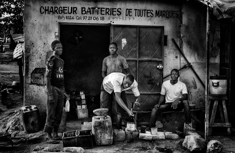 African Street Battery Shop by Joxe Inazio Kuesta Garmendia — canvas wall art