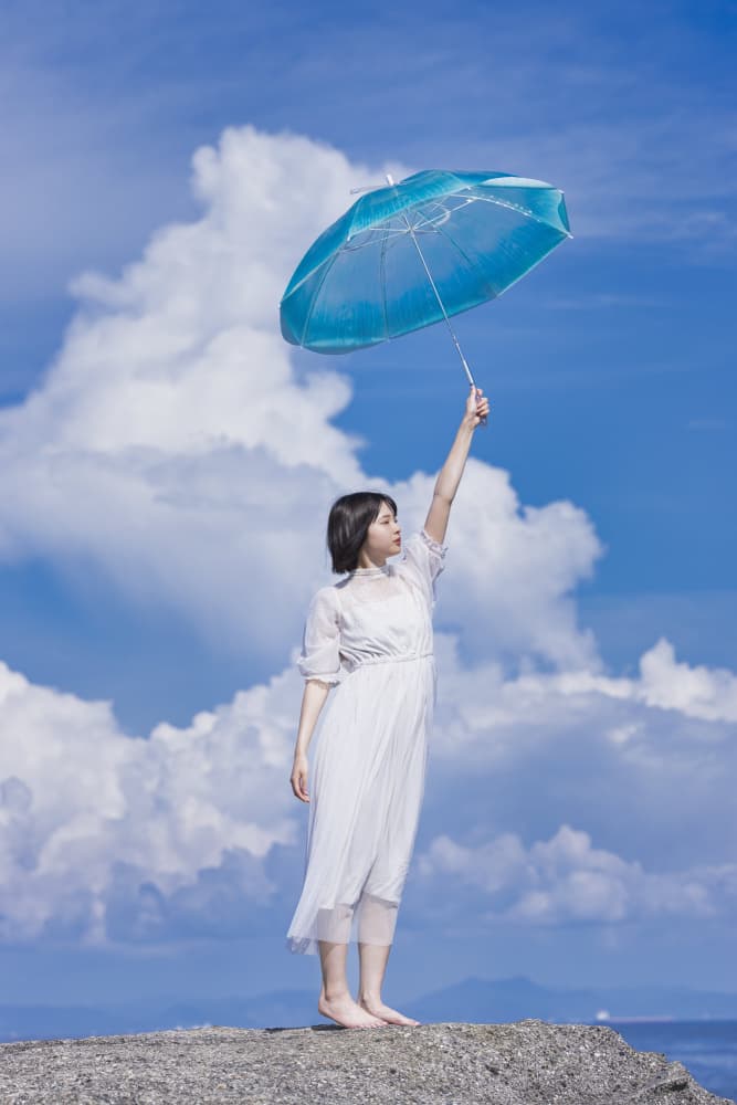 Woman And Sky Umbrella by SHIMA — canvas wall art