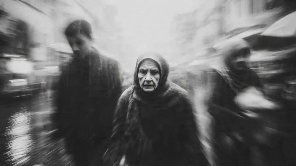 Elderly Woman Street Gaze by Erkan Camlilar — canvas wall art