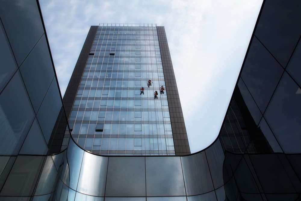 Skyscraper Window Cleaners by Jurij Bizjak — canvas wall art