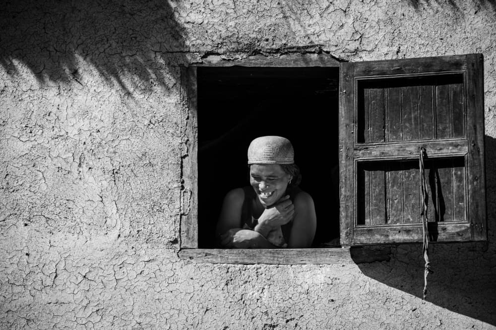 Smiling Woman Window by António Carreira — canvas wall art