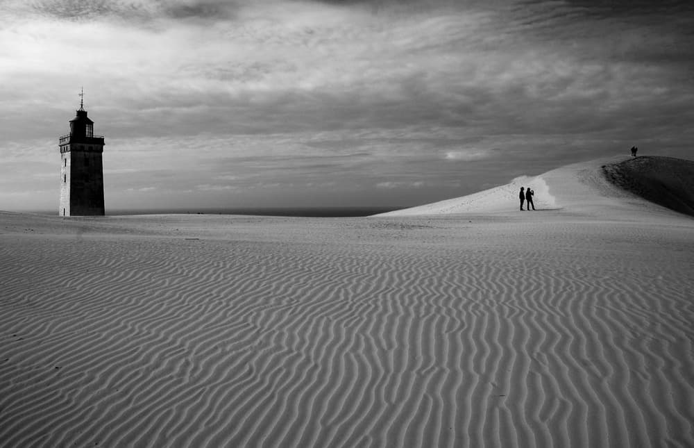 Solitary Lighthouse Dunes by Ole Nielsen — canvas wall art