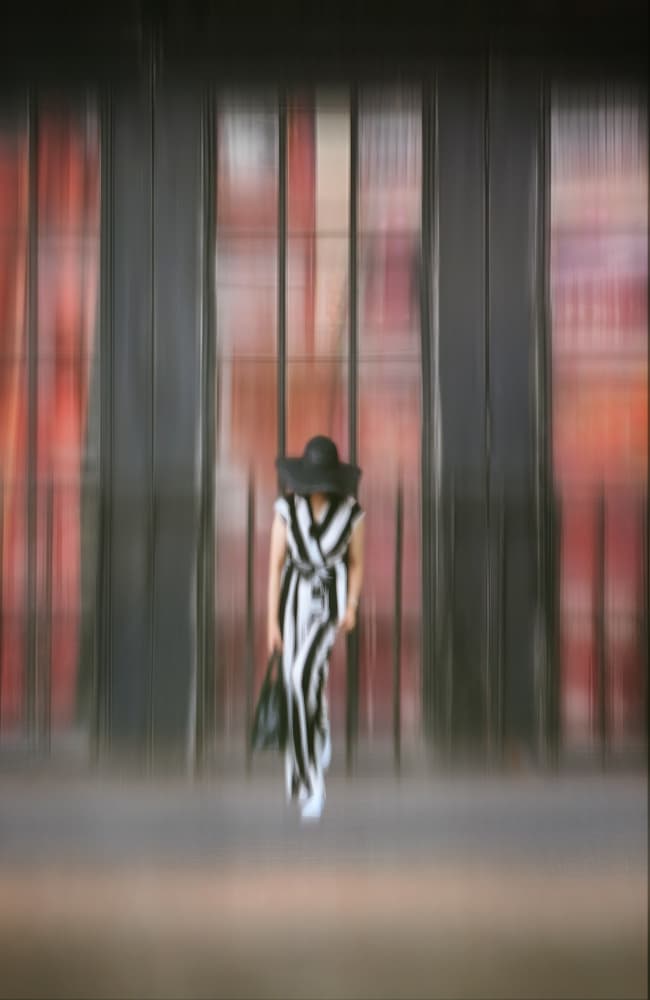Stylish Woman Motion Blur by Hui — canvas wall art