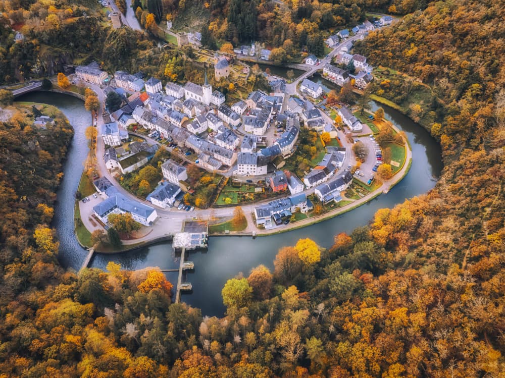 Autumn Village River Bend by Guy Krier — canvas wall art