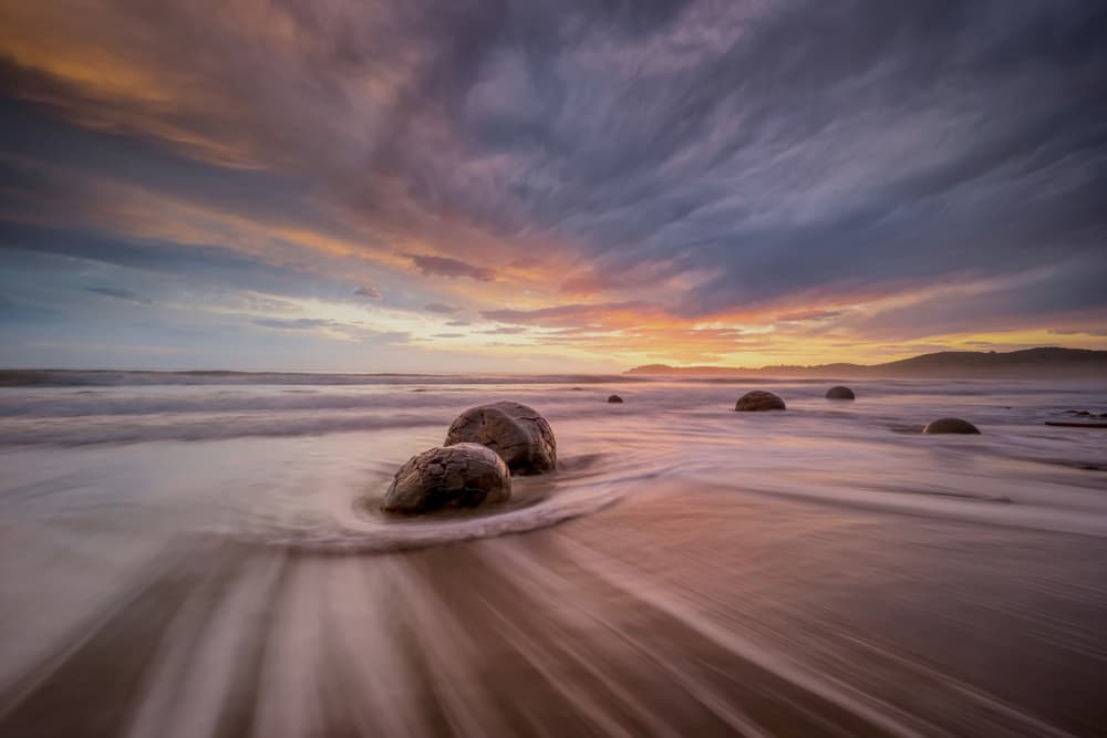 Sunset Beach Boulders by James Zhen Yu — canvas wall art