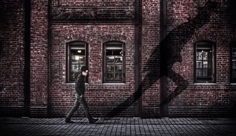 Man's Running Shadow by Takashi Suzuki — canvas wall art