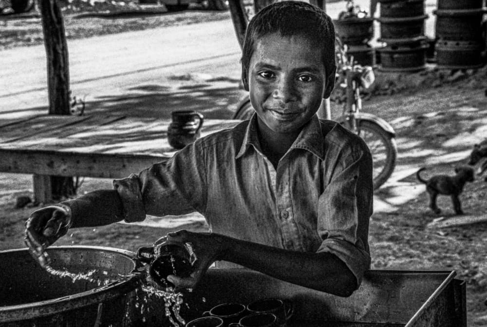 Happy Boy At Work by Joxe Inazio Kuesta Garmendia — canvas wall art