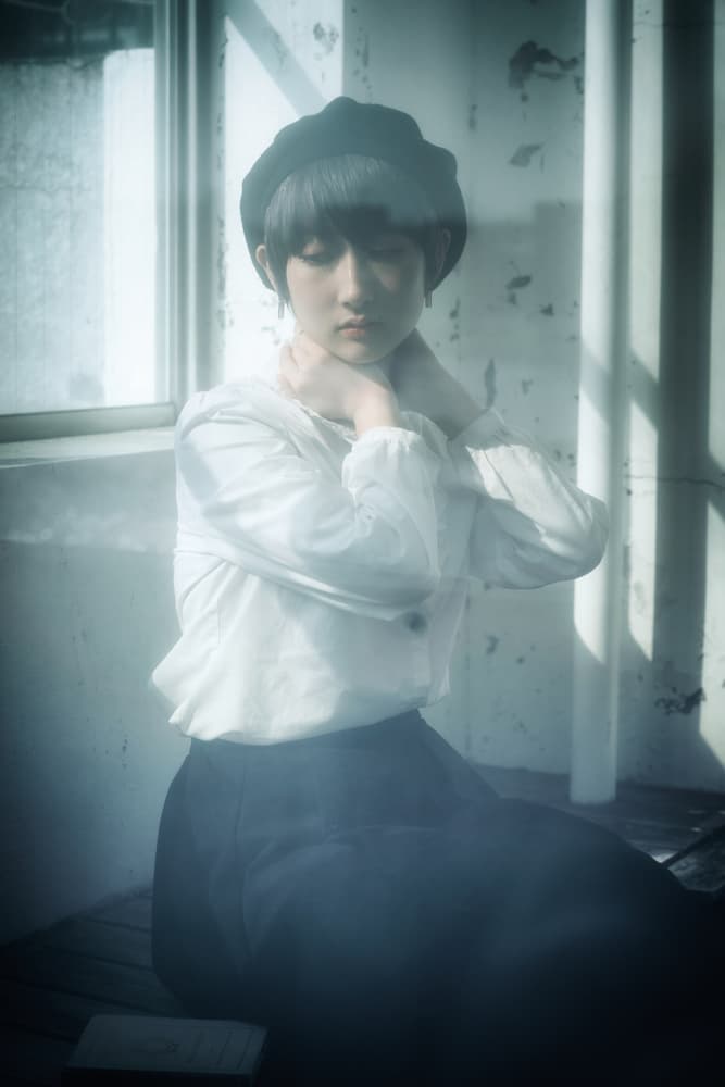 Pensive Girl in Light by Nobu Ishijima — canvas wall art