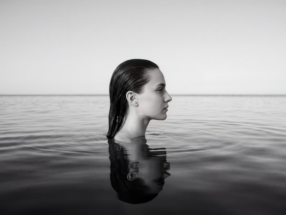 Woman In Water Reflection by Andreas Magnusson — canvas wall art