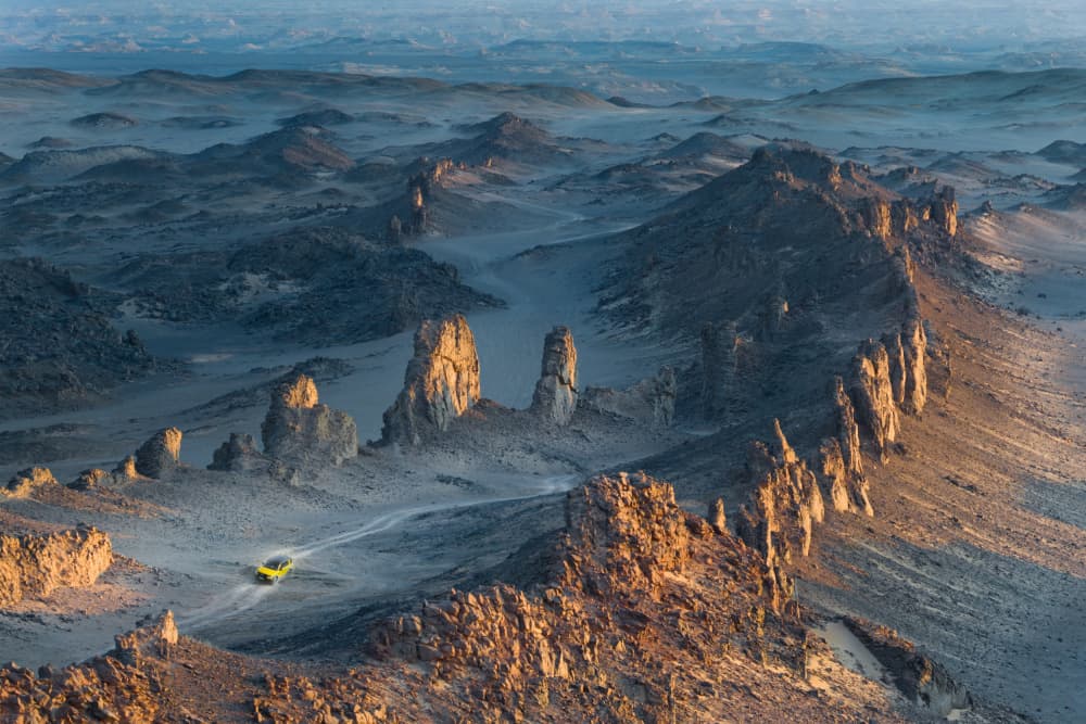 Golden Desert Rock Drive by Simoon — canvas wall art