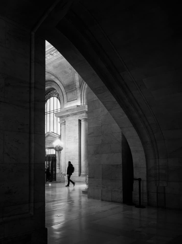 Lone Figure in Grand Hall by Annette Guo — canvas wall art