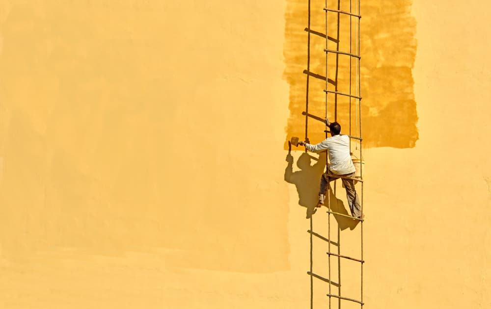Man Painting Golden Wall by Anette Ohlendorf — canvas wall art