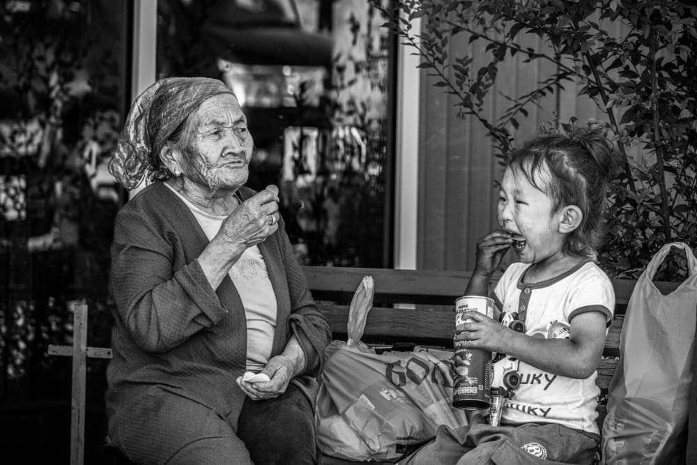 Joyful Child And Grandmother by Joško Šimic — canvas wall art