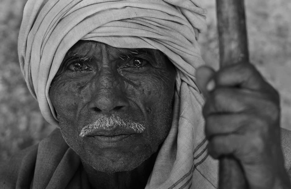 Pensive Indian Farmer by Lou Urlings — canvas wall art