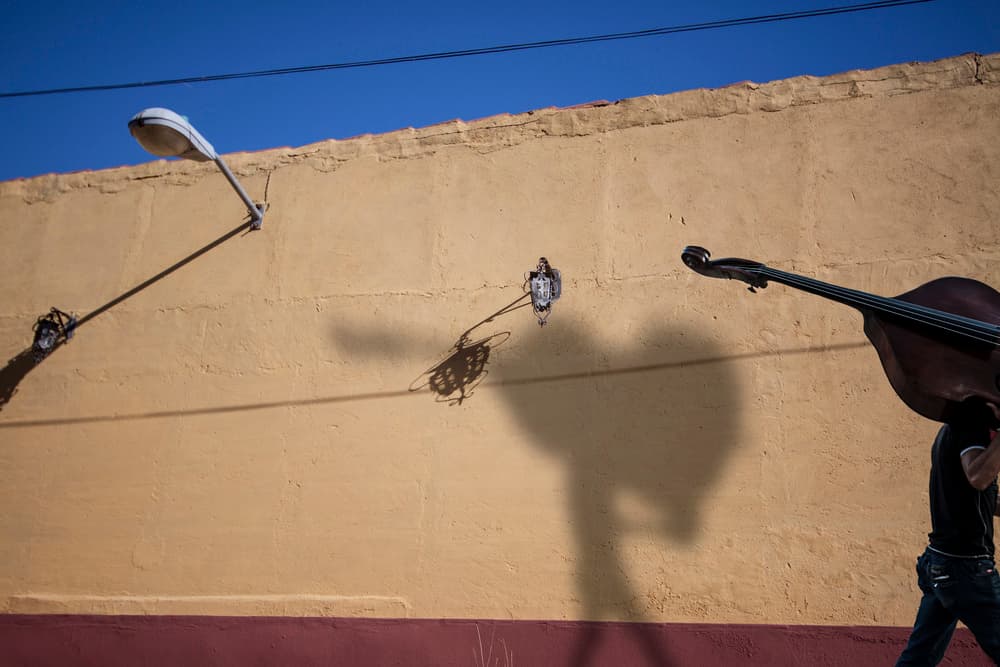 Street Musician And Shadows by Svetlin Yosifov — canvas wall art