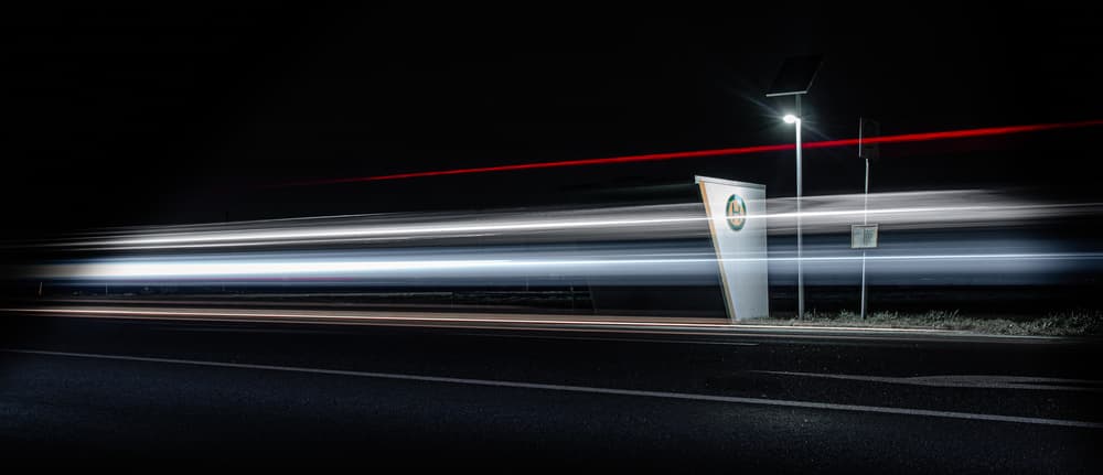 Night Highway Light Trails by Jörg Vollrath — canvas wall art